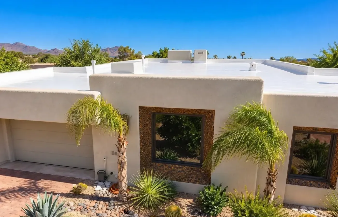 Side view of a stucco home with a parapet roofline